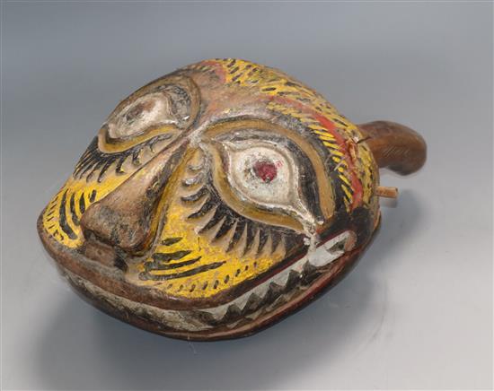 A Javanese painted wood tigers head vessel